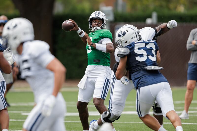 BYU quarterback Gerry Bohanon looks to to throw during practice Tuesday, Aug. 13, 2024 in Provo.