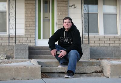 CJ McManus poses for a portrait in Price on Tuesday, Dec. 19, 2017. Carbon County is facing an opioid addiction epidemic. McManus is going through drug court for the second time
and has been sober for 20 months. He rents an apartment in the back of this