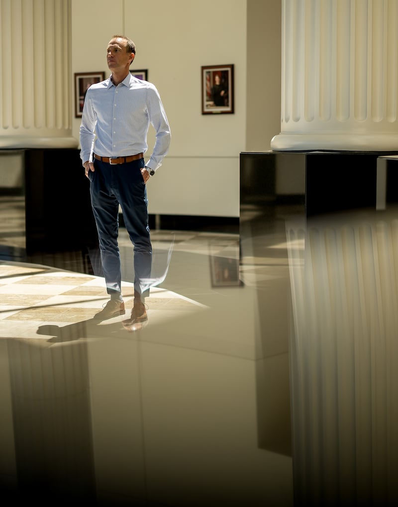 Utah Supreme Court Justice Thomas Lee, 57, poses for a photo outside the Supreme Court in Salt Lake City on Friday, June 10. He retired Thursday after 12 years on the high court.
