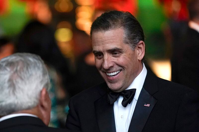 Hunter Biden talks with guests during a State Dinner at the White House in Washington.