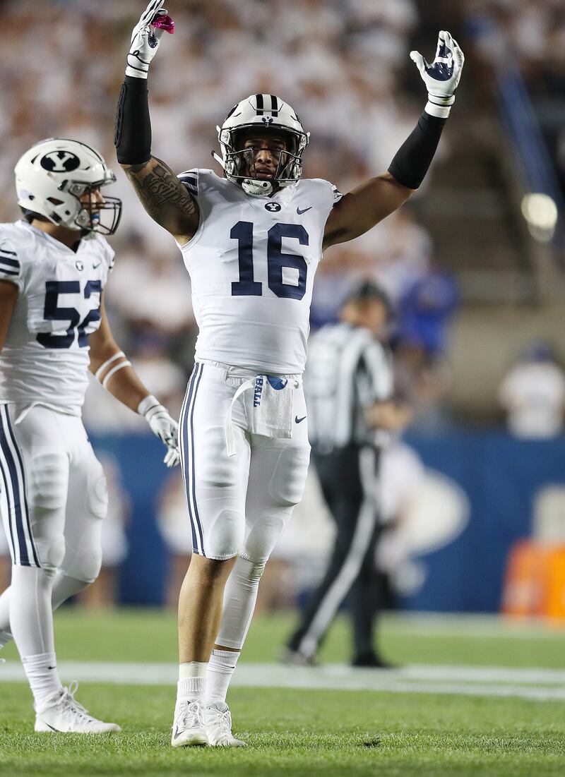 Brigham Young Cougars linebacker Sione Takitaki (16) celebrates a stop against the California Golden Bears in Provo on Saturday, Sept. 8, 2018.