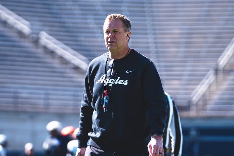 First-year Utah State head coach Bronco Mendenhall looks on during spring camp in Logan.