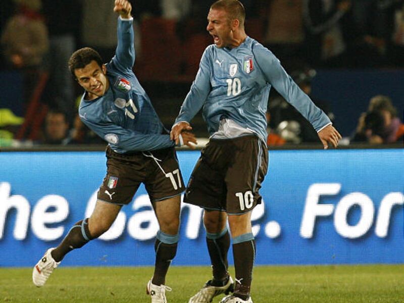 Italy's Giuseppe Rossi, left, celebrates with teammate Daniele De Rossi after scoring a goal during their Confederations Cup Group B soccer match Monday.