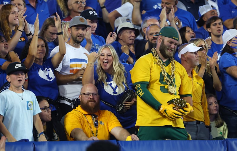 BYU fans cheer after the catch by Brigham Young Cougars wide receiver Chase Roberts (27) was ruled inbounds as BYU and Baylor play at LaVell Edwards Stadium in Provo on Saturday, Sept. 10, 2022.