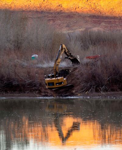 An excavator works on a channel connecting a fish nursery to the Colorado River in the Scott M. Matheson Wetlands Preserve in Moab on Thursday, Jan. 24, 2019. The nursery will help the razorback sucker, an endangered fish that has a tough time surviving a