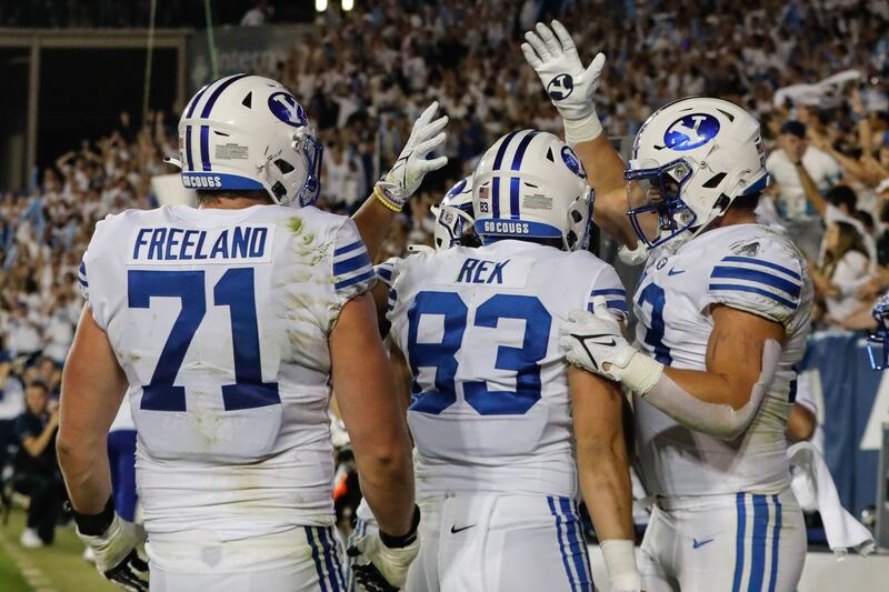 Brigham Young tight end Isaac Rex (83) celebrate the final touchdown of an NCAA college football game against Arizona State.