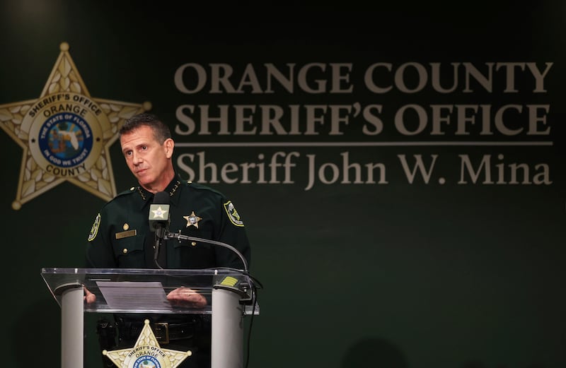 Orange County Sheriff John Mina addresses the media during a press conference about multiple shootings in Orlando, Fla.