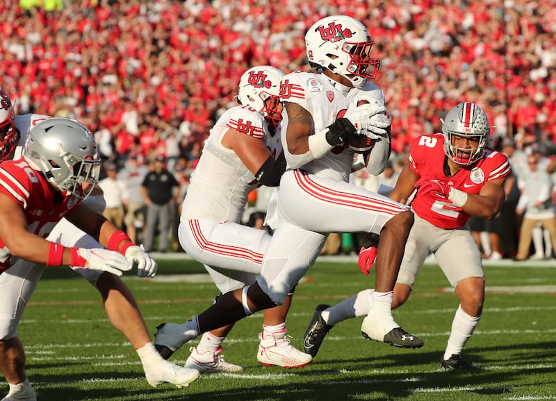 Utah running back Tavion Thomas scores during the Rose Bowl in Pasadena on Saturday, Jan. 1, 2022.