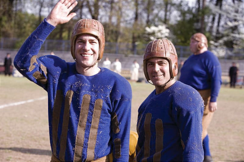 John Krasinski, left, and George Clooney, who also directed, star in the comedy "Leatherheads."