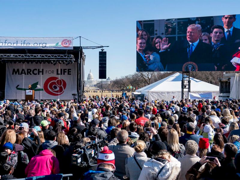 President Donald Trump speaks via a live feed to anti-abortion activists as they rally on the National Mall in Washington, on Jan. 19, 2018, during the annual March for Life. Thousands of anti-abortion demonstrators gather in Washington for an annual marc