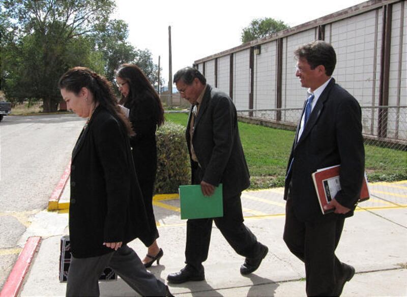 Navajo Vice President Ben Shelly, second from right, leaves tribal court on Thursday in Window Rock, Ariz. Shelly, who is seeking the tribal presidency, pleaded not guilty to charges of fraud, theft and conspiracy.