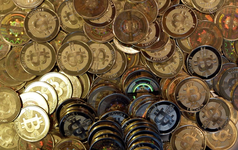 Pile of physical Bitcoins, known as Casascius coins, which were created by Mike Caldwell in Sandy, Utah.