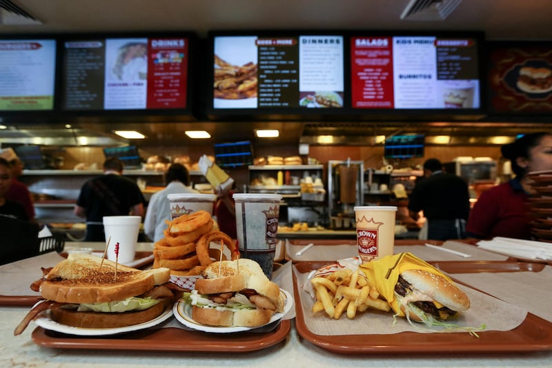Food waits to be picked up by a customer at Crown Burgers in Salt Lake City.