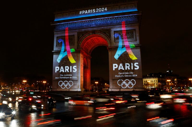 The Eiffel Tower-shaped bid logo for the Paris 2024 is unveiled on The Arc of Triomphe in Paris, France, on Feb. 9, 2016.