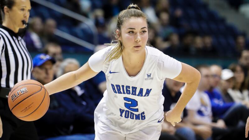 Shaylee Gonzales drives to the hoop. She had a game and career-high 20 points against the Aggies.