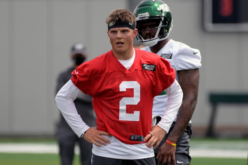 New York Jets first round draft pick Zach Wilson (2) works out during NFL football rookie camp.