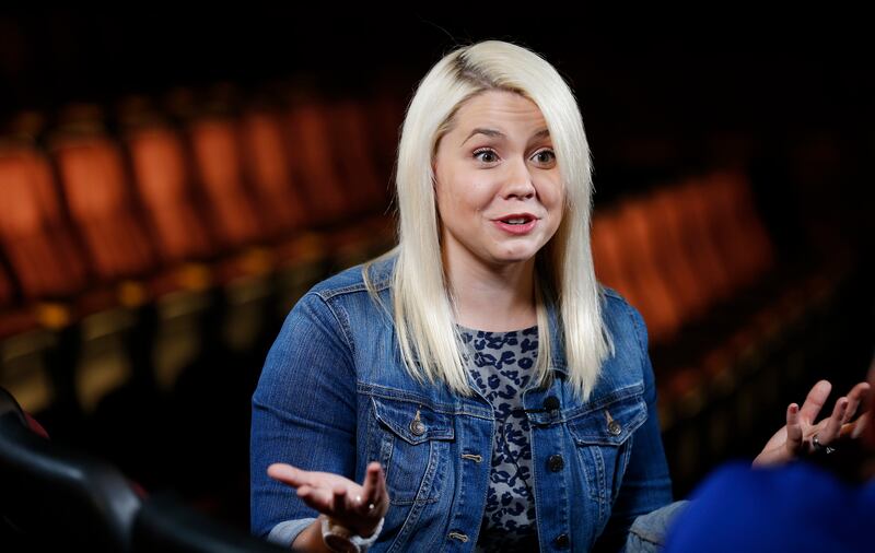 Host Jenna Kim Jones is interviewed as media talk with the international cast and crew members of the film “Meet the Mormons” in Salt Lake City on Tuesday, Oct. 7, 2014. Religion and comedy often mix, but it's difficult for comedians to determine the best