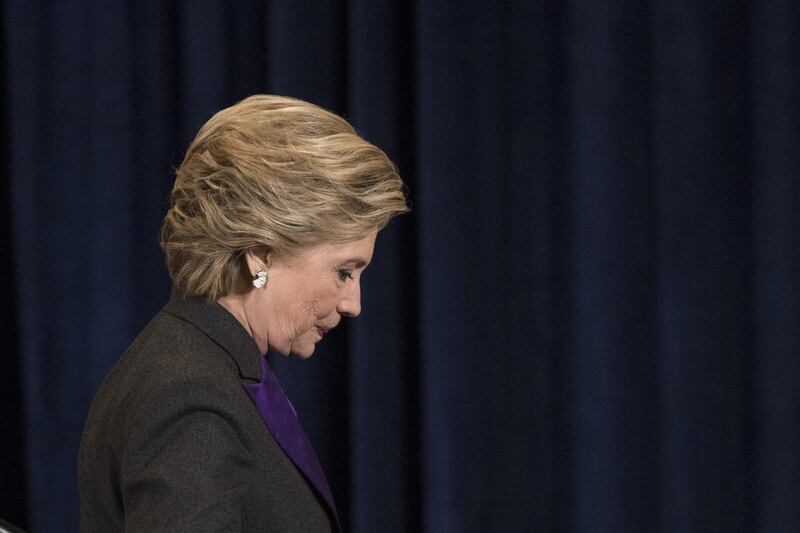 Democratic presidential candidate Hillary Clinton walks off the stage after speaking in New York, Wednesday, Nov. 9, 2016. Clinton conceded the presidency to Donald Trump in a phone call early Wednesday morning, a stunning end to a campaign that appeared