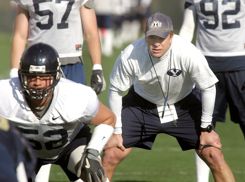 Bronco Mendenhall, BYU’s new head football coach watches a drill closely during BYU spring football practice. March 17, 2005.