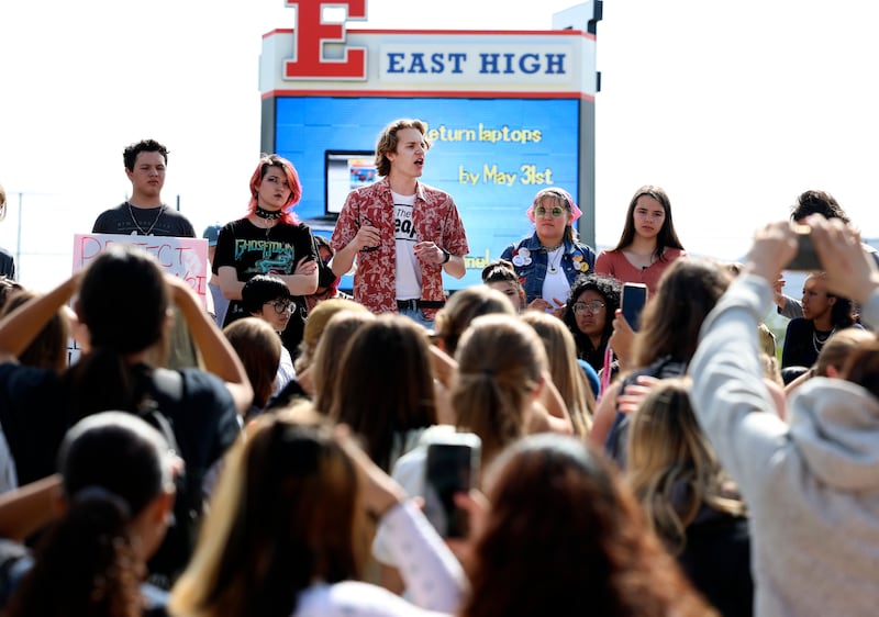 East High School student Max Rhineer speaks during a walkout at the school in Salt Lake City on Friday to protest gun violence.