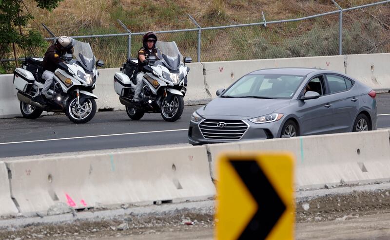 Utah Highway Patrol troopers enforce the speed limit in a construction zone on I-80.