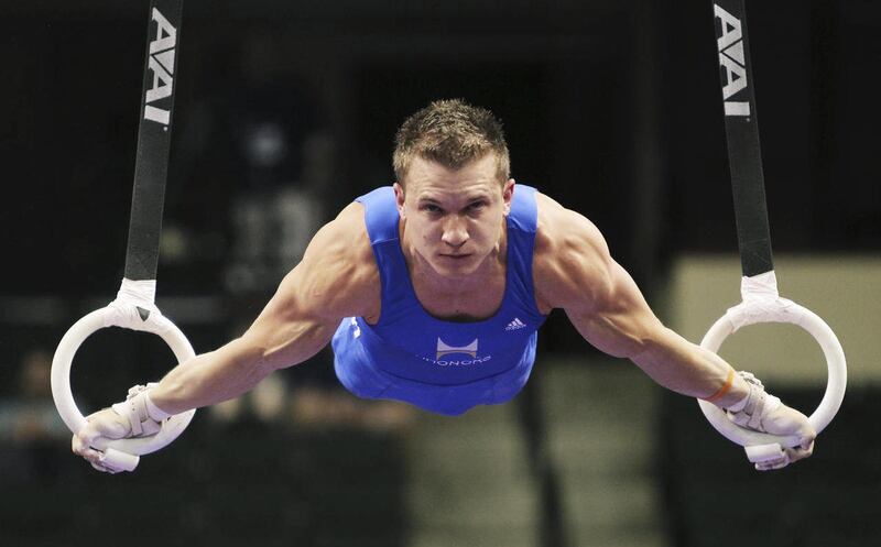 Jonathan Horton competes on the rings during the U.S. gymnastics championships Friday, Aug. 19, 2011, in St. Paul, Minn.
