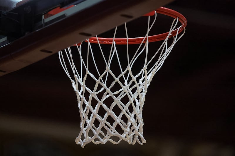 The hoop is pictured during a high school basketball game on Tuesday, Dec. 12, 2023.