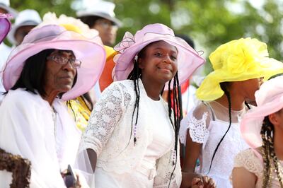 Members of Mama's Temple Choir Church pass by during the Days of '47 Parade in Salt Lake City on Wednesday, July 24, 2019.
