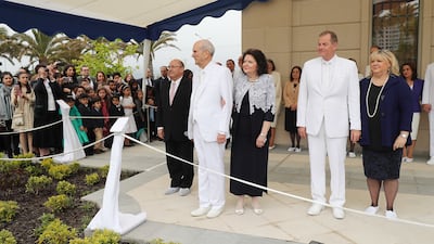 President Russell M. Nelson of The Church of Jesus Christ of Latter-day Saints and his wife, Sister Wendy Nelson, at center and Elder Gary E. Stevenson of the Quorum of the Twelve Apostles and his wife, Sister Lesa Stevenson, right, pause during the corne