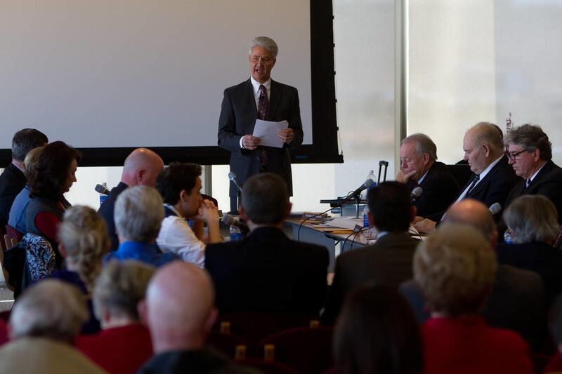 Dixie State College's Chairman of the Board of Trustees Steven Caplin reads a statement regarding the college's moniker and explains the board's decision to apply for university status under the name Dixie State University during the board's meeting Frida
