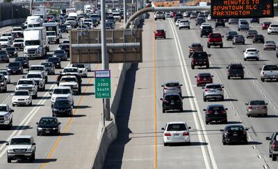 Traffic on I-15 near 5300 South in Murray is pictured on Thursday, July 12, 2018.