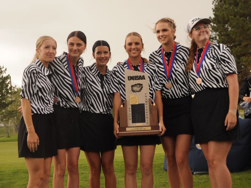 Monticello’s girls golf team celebrates its first state golf championship on Wednesday, May 17, 2022, in Richfield, Utah.
