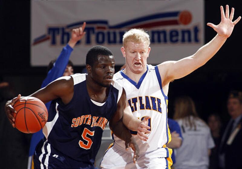 South Plains College's Jonathan Hall is defended by SLCC's Dan Stafford during Saturday's finals.