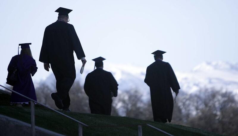 Weber State University students leave commencement exercises in Ogden Friday, April 26, 2013.