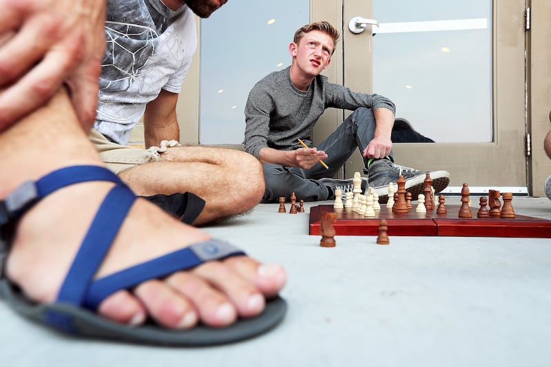 Zachary watches a game of chess on Tuesday, July 31, 2018, at the WayPoint Academy in Huntsville, Utah, where boys come from around the world to learn coping skills and structure their lives. WayPoint's treatment center and boarding school includes an int