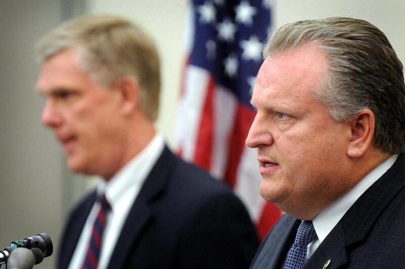 Grand Rapids Police Chief Kevil Balk, right, speaks Tuesday, Oct. 4, 2011 during a news conference in Grand Rapids about a report detailing their investigation of Rodrick Dantzler's mass murder spree. Grand Rapids police released new information about the