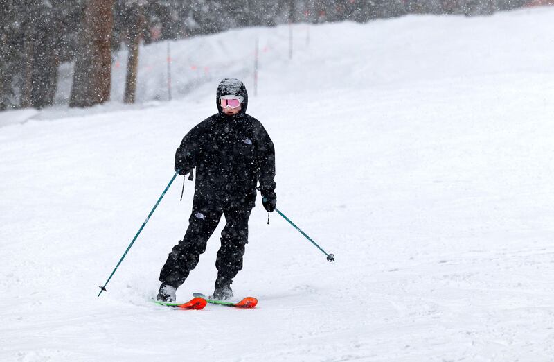 A skier skis down at Brighton Resort in Big Cottonwood Canyon.