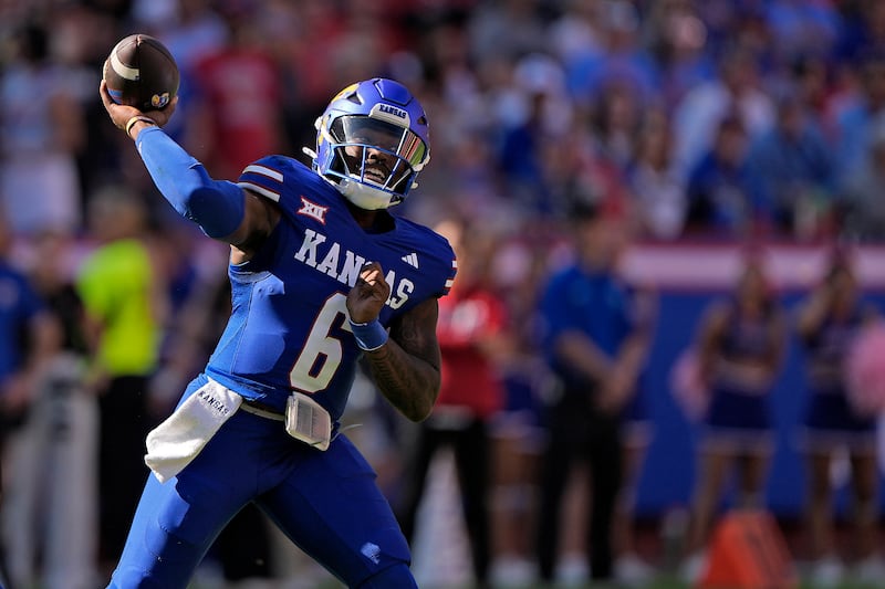 Kansas quarterback Jalon Daniels passes during game against Houston, Saturday, Oct. 19, 2024, in Kansas City, Mo. Daniels and the Jayhawks will swoop into LaVell Edwards Stadium Saturday for a late-night showdown with No. 7 BYU.