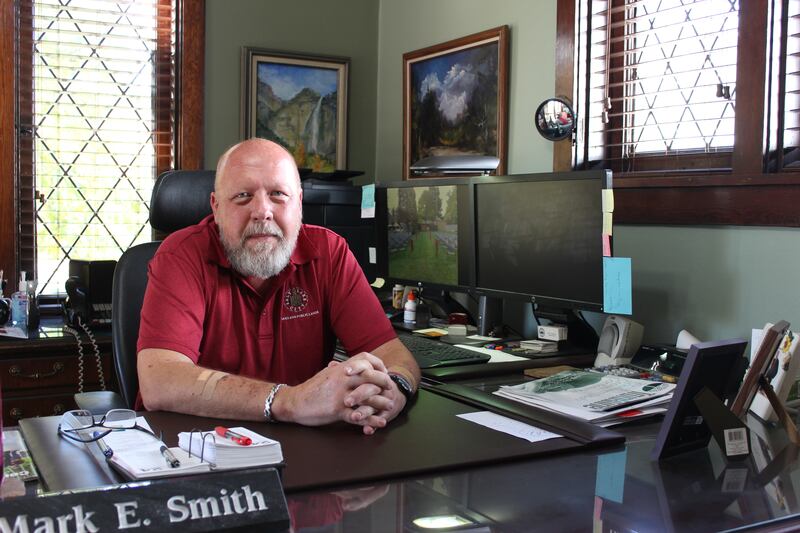 Sexton Mark E. Smith is one of the authors of "Salt Lake Cemetery."