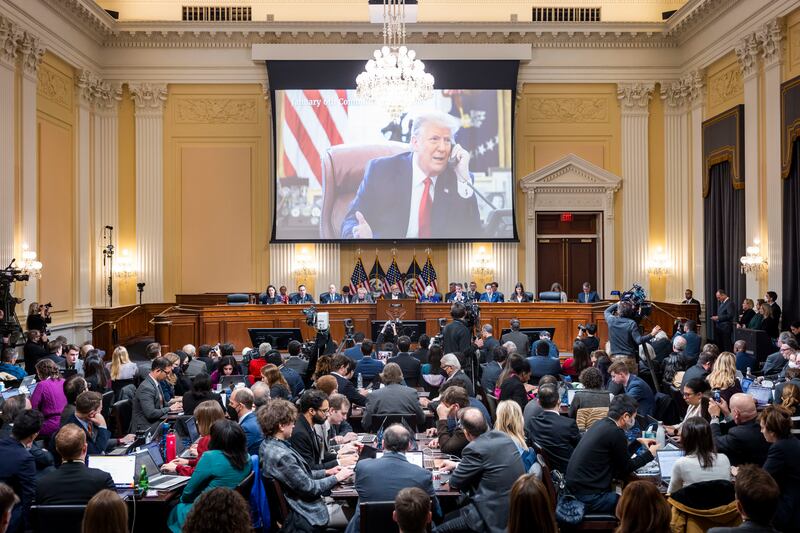 A video of former President Donald Trump is shown on a screen, as the House select committee investigating the Jan. 6 attack on the U.S. Capitol holds its final meeting on Capitol Hill in Washington, Monday, Dec. 19, 2022.