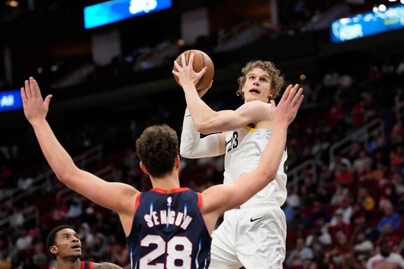 Utah Jazz’s Lauri Markkanen (23) goes up for a shot as Houston Rockets’ Alperen Sengun (28) defends during the second half of an NBA basketball game Thursday, Jan. 5, 2023, in Houston. Utah won (AP Photo/David J. Phillip)