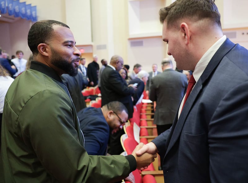 People in the audience interact in the Martin Luther King Jr. International Chapel at Morehouse College in Atlanta, Georgia, on Sunday, Feb. 1, 2026.