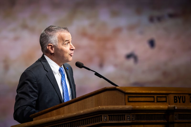 BYU President Shane Reese reads a message from President Jeffrey R. Holland on Sept. 24, 2024.
