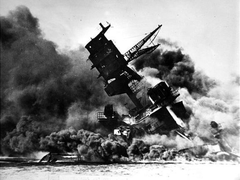 The USS Arizona goes down in a plume of smoke following the Japanese attack on Pearl Harbor on Dec. 7, 1941.
