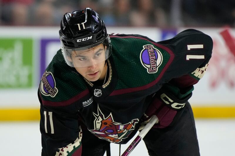 Arizona Coyotes right wing Dylan Guenther (11) during an NHL game against the Detroit Red Wings, Friday, March 8, 2024, in Tempe, Ariz.