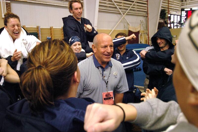 BYU Swimming and Diving head coach Tim Powers with his team at the 2007 Mountain West Conference Swimming and Diving Championships.