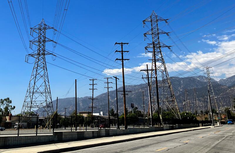 Electrical grid towers are seen during a heat wave where temperature reached 105 in Pasadena, Calif., on Wednesday.