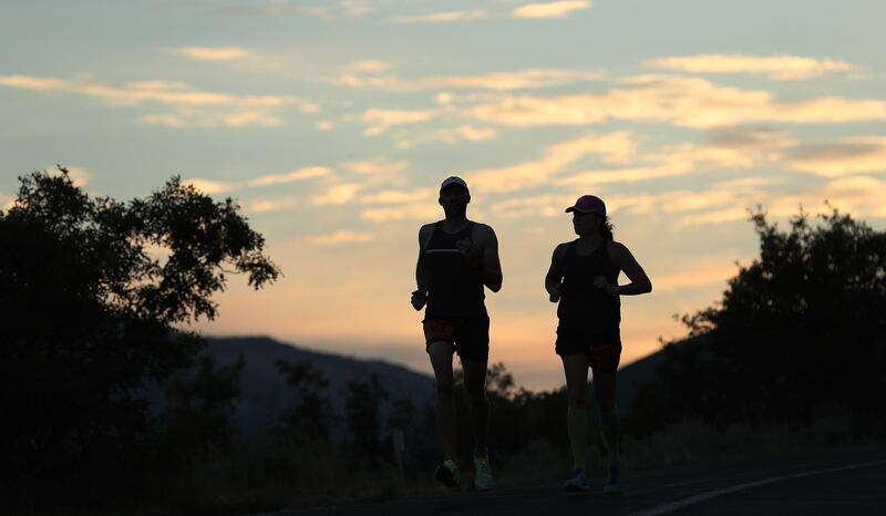 Runners compete in the Deseret News marathon in Emigration Canyon on Tuesday, July 24, 2018.