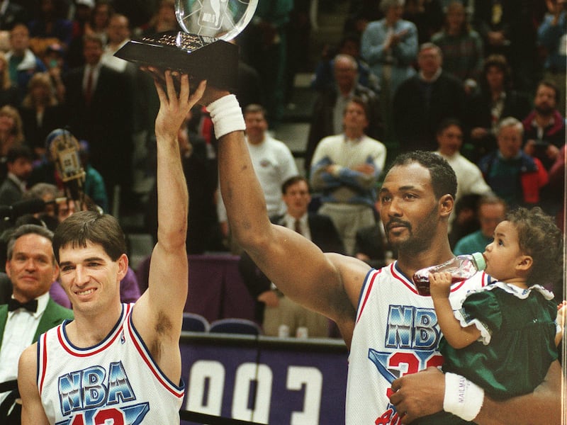 John Stockton and Karl Malone celebrate thier co-MVP award at the NBA All-Star Game in the Feb. 1993, in Salt Lake City.