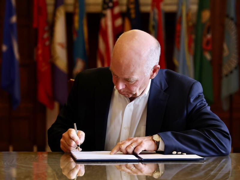 Republican Gov. Greg Gianforte signs a law banning TikTok in the state, Wednesday, May 17, 2023, in Helena, Mont.